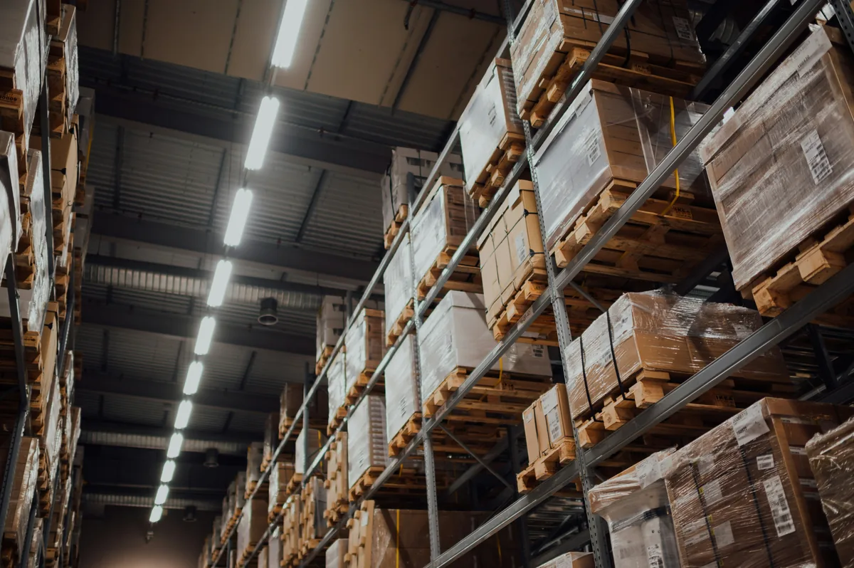 Cardboard boxes on warehouse shelving